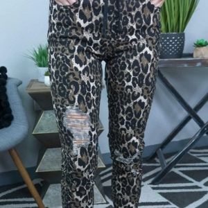 YMI HIGH RISE DISTRESSED LEOPARD JOGGER JEANS WITH FRAYED HEM